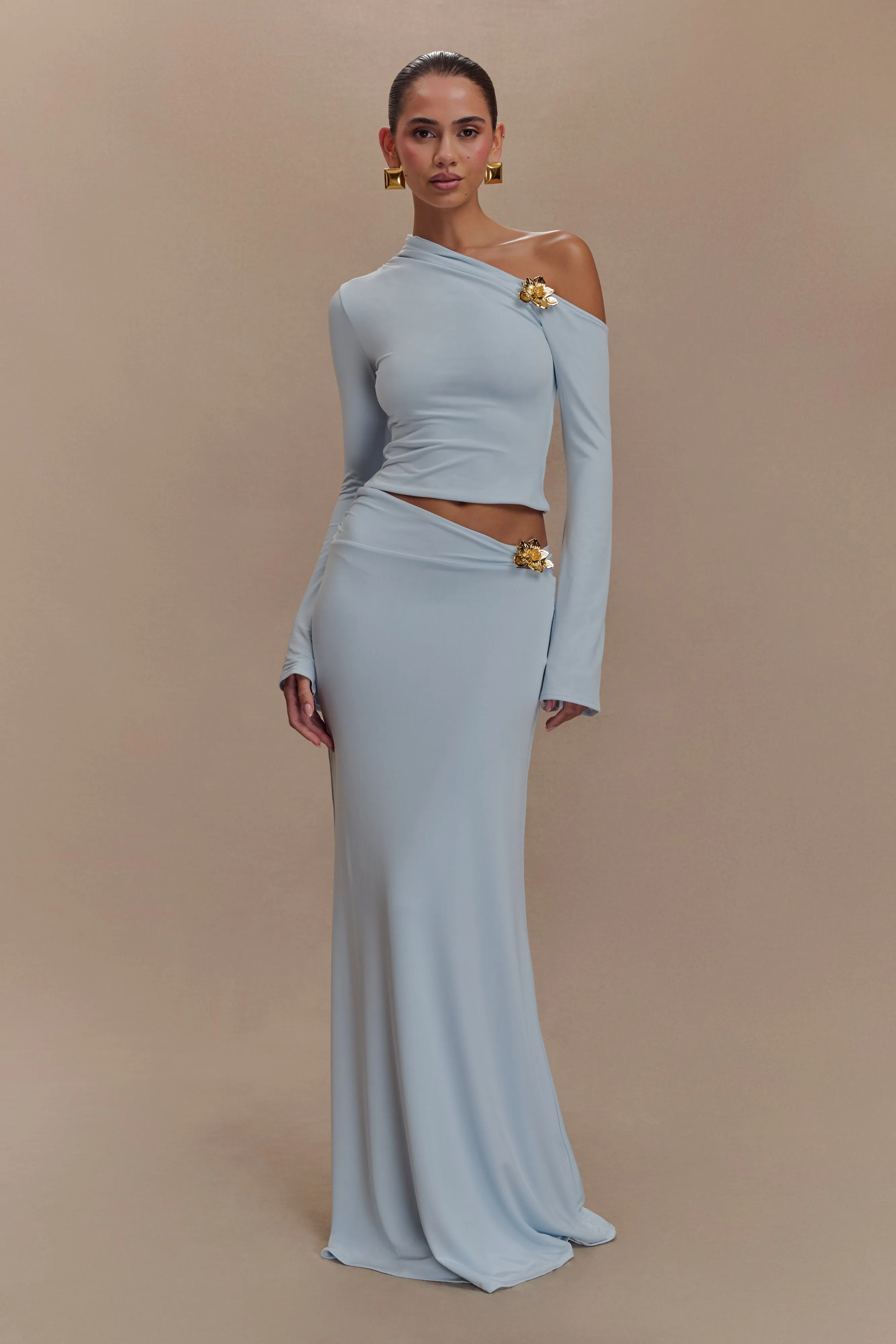 Ainsley Asymmetrical Long Sleeve Top With Floral Hardware - Pale Blue FlexibleCuffs
