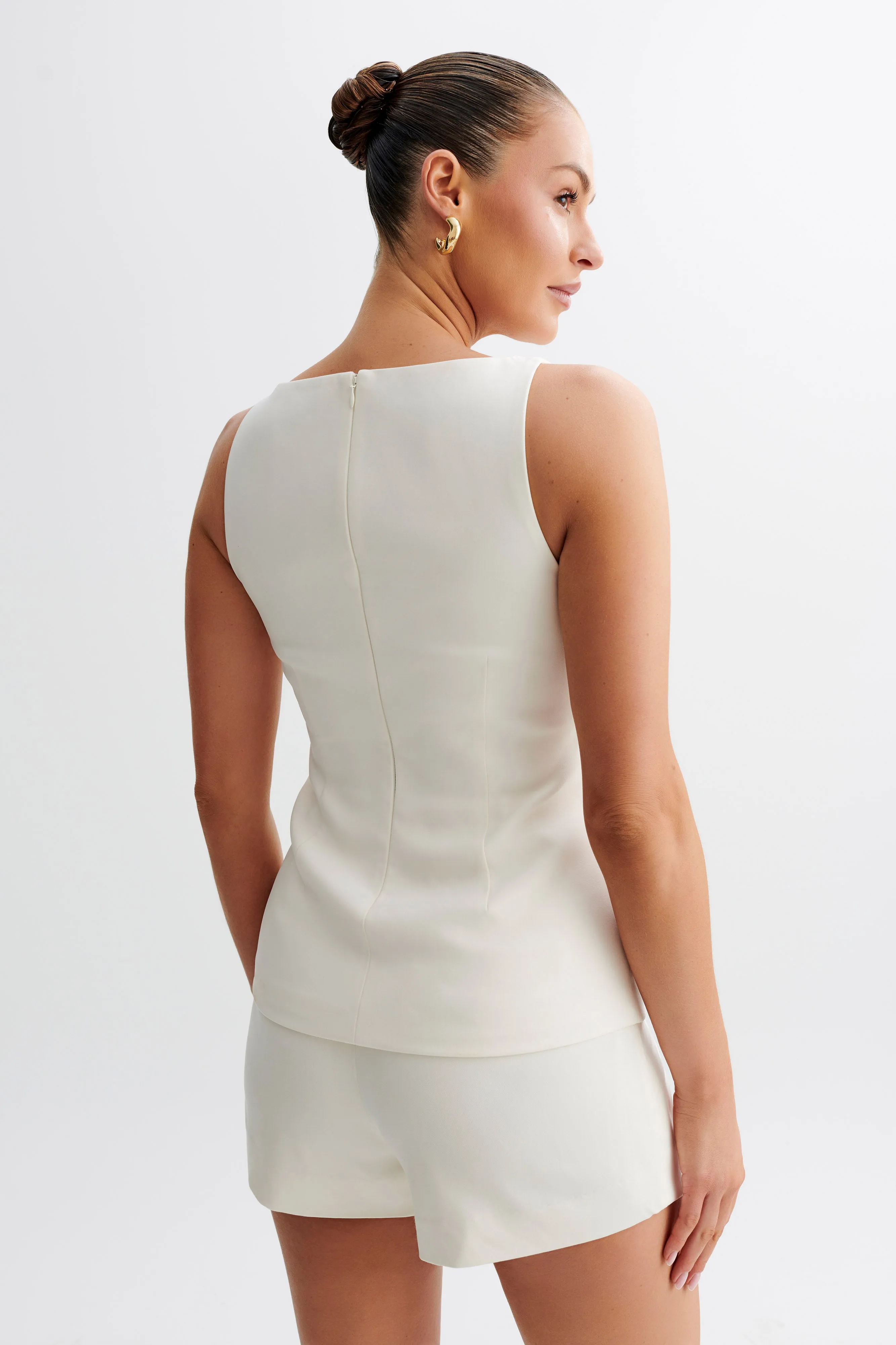 Angela Sleeveless Suiting Top - Ivory Curved Hem