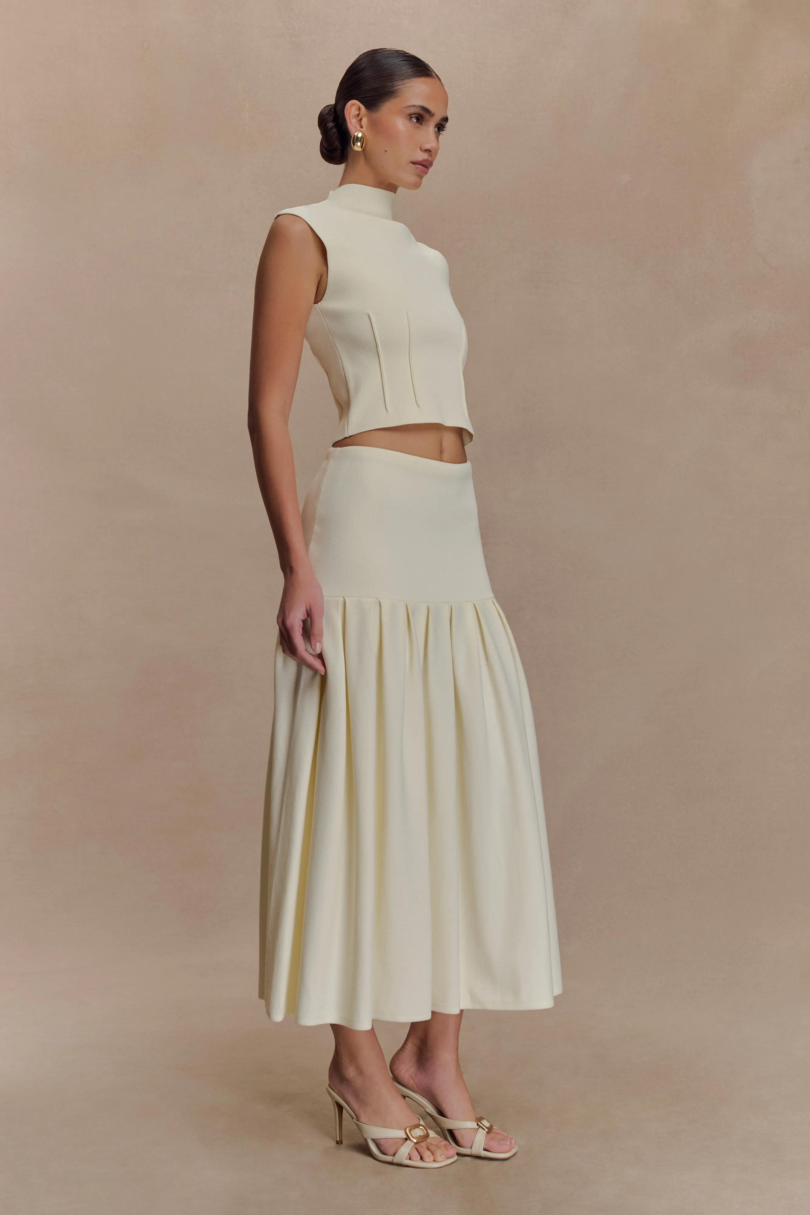 ReinforcedShoulderConstruction QuickRelease Closure Romaine High Neck Bandage Knit Top - Ivory