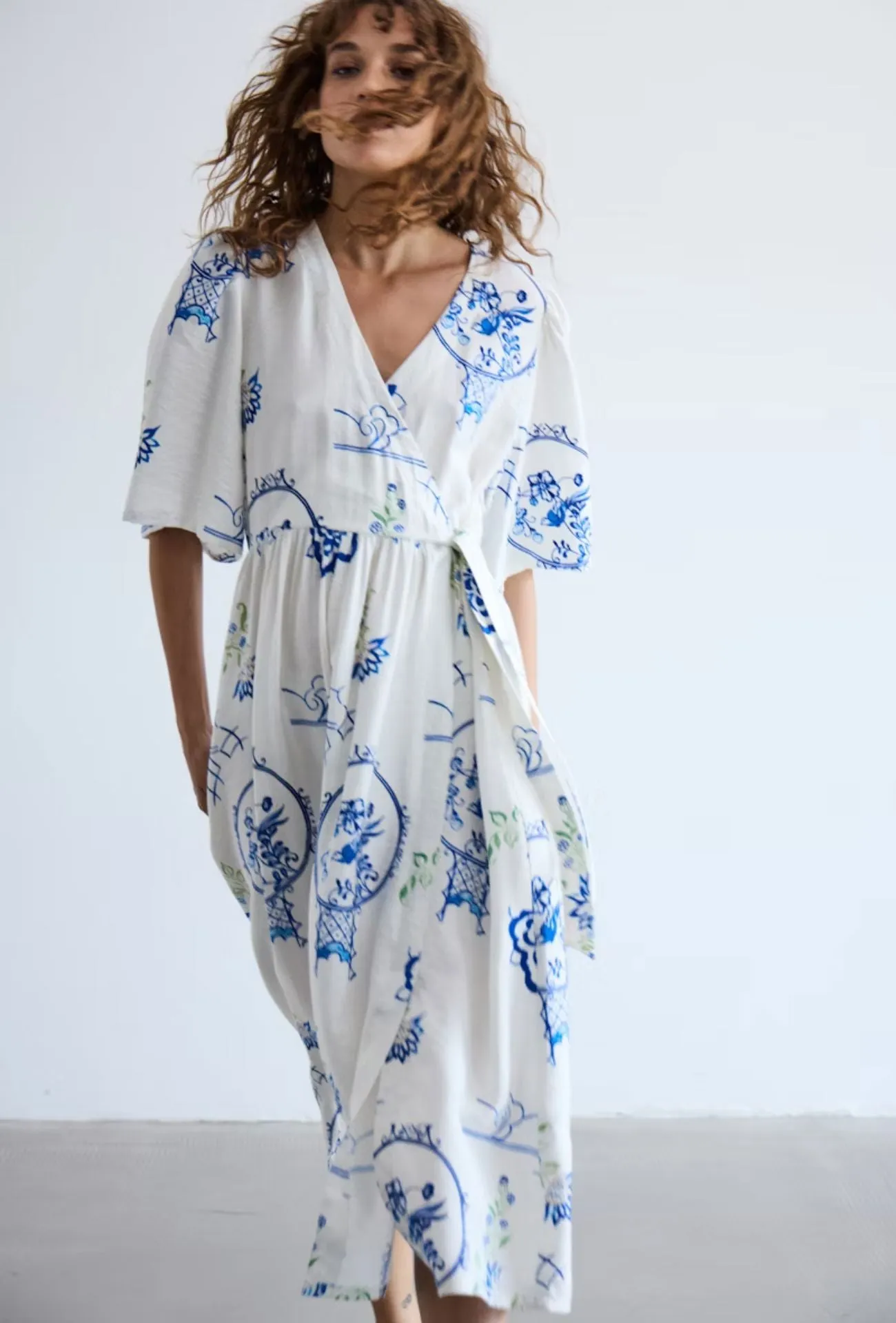 SANTORINI WRAP DRES Essential Piece